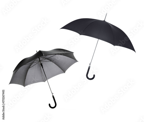 Black umbrellas on a white background