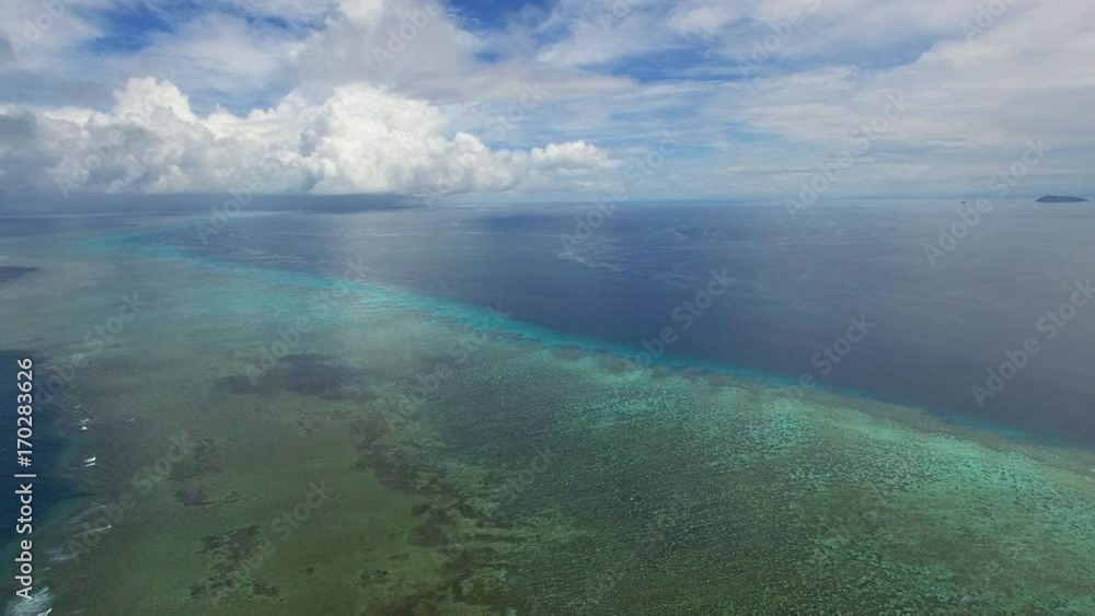 A wide shot of the ocean. Shot slowly pans to the right to show. A wide shot of the ocean. Shot slowly pans to the right to show.