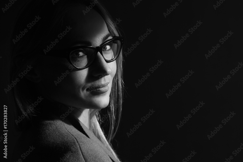 Beauty portrait of a young beautiful brunette girl with long straight flying hair. Magnificent hair. Black and white. Beauty portrait of a young beautiful brunette girl with long straight flying hair. Magnificent hair. Black and white.