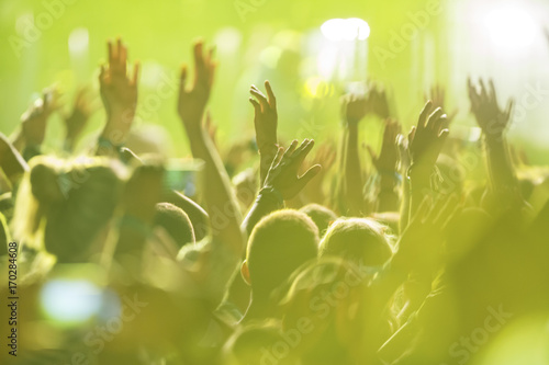 Young people having fun at music concert