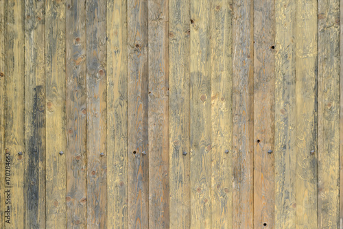 Background texture of old wooden planks knocked vertically