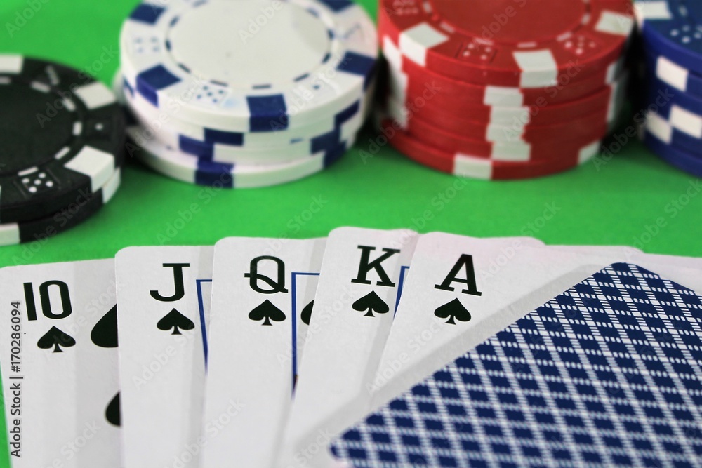 An image of a royal flah - poker, chips An image of a royal flah - poker, chips