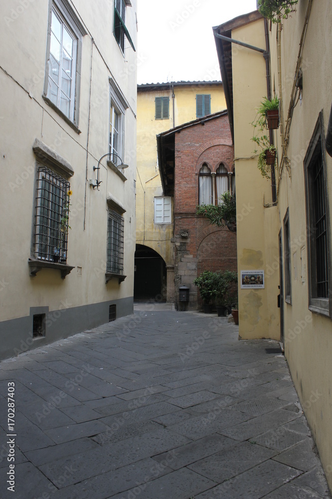 Narrow street in Lucca city centre, Tuscany, nobody around