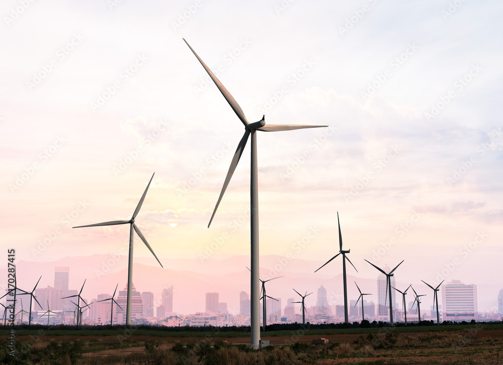 Wind turbine renewable energy source summer landscape with blue sky in natural landscapes