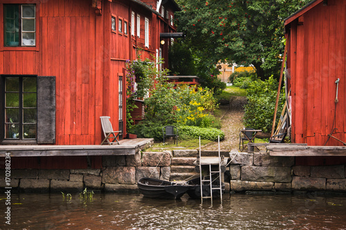 Old red wooden barns in the city of Porvoo in Finland.