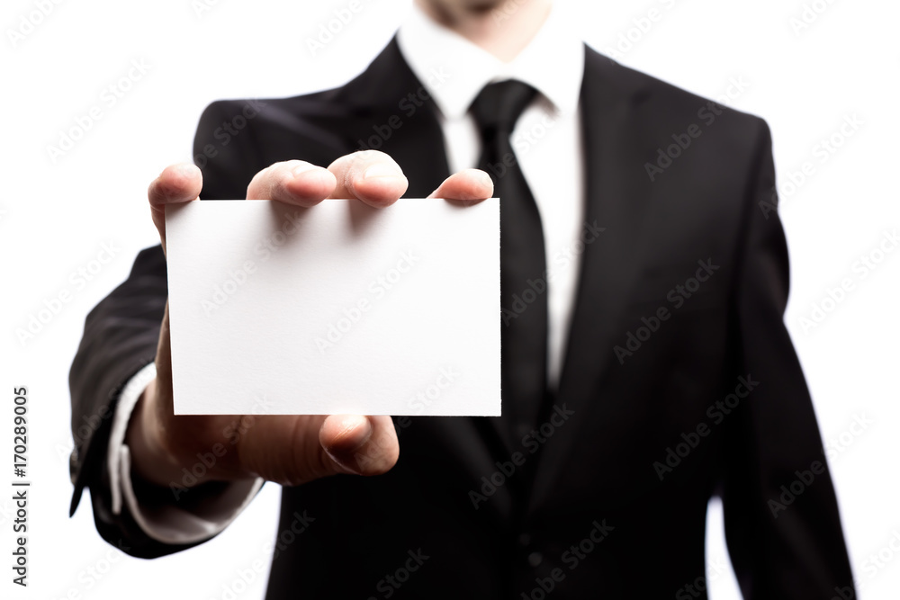 Businessman with a blank business card isolated on a white background Businessman with a blank business card isolated on a white background