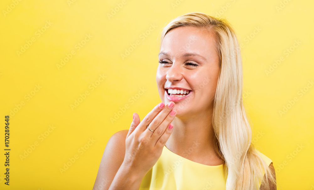 Happy young woman on a solid background Happy young woman on a solid background