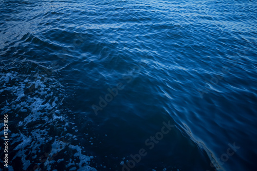 Blue color abstract background of liquid wave based on water wave © akkalak