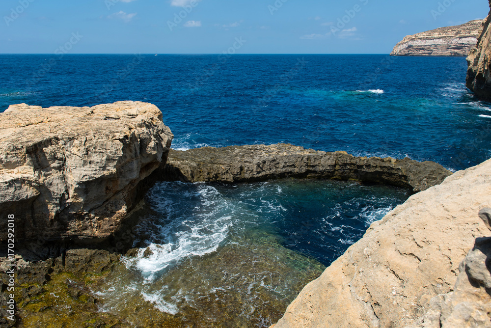 Blue hole and the collapsed Azure window. Gozo, Malta