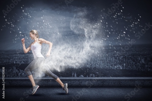 Composite image of pretty fit blonde jogging 