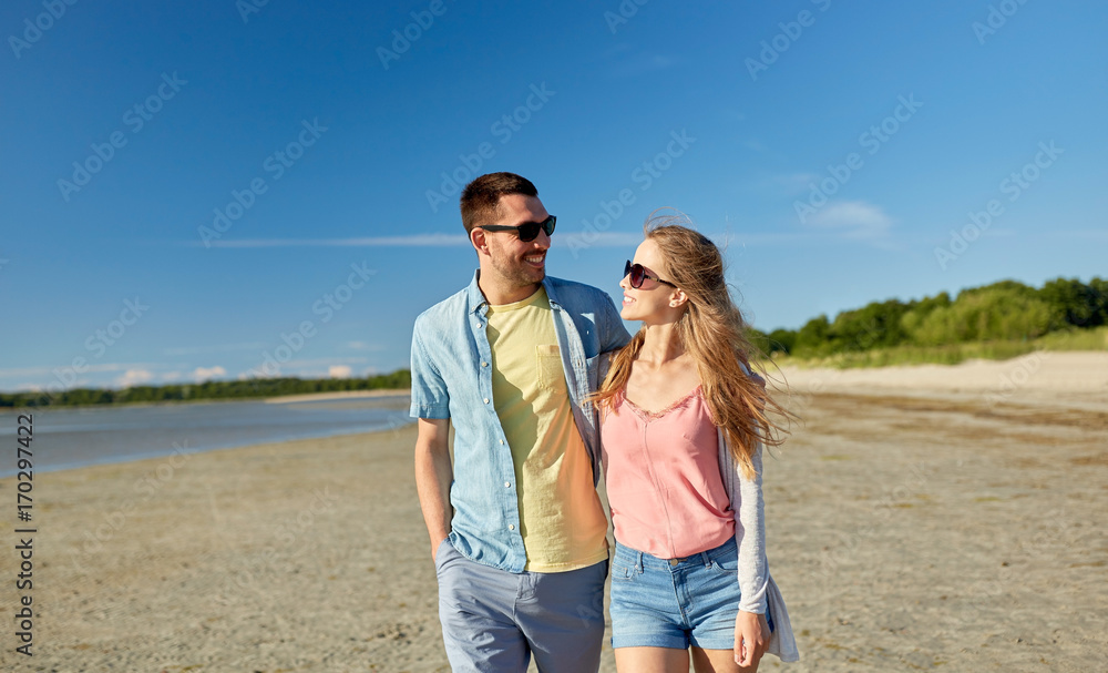 happy couple hugging on summer beach happy couple hugging on summer beach