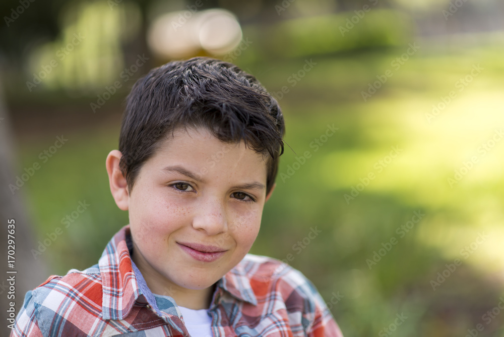 portrait of a casual teen boy, outdoors portrait of a casual teen boy, outdoors