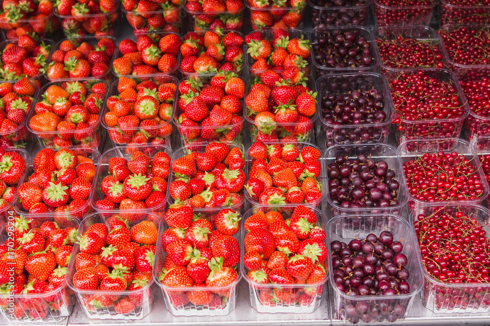 Street market in Europe. Selling berries
