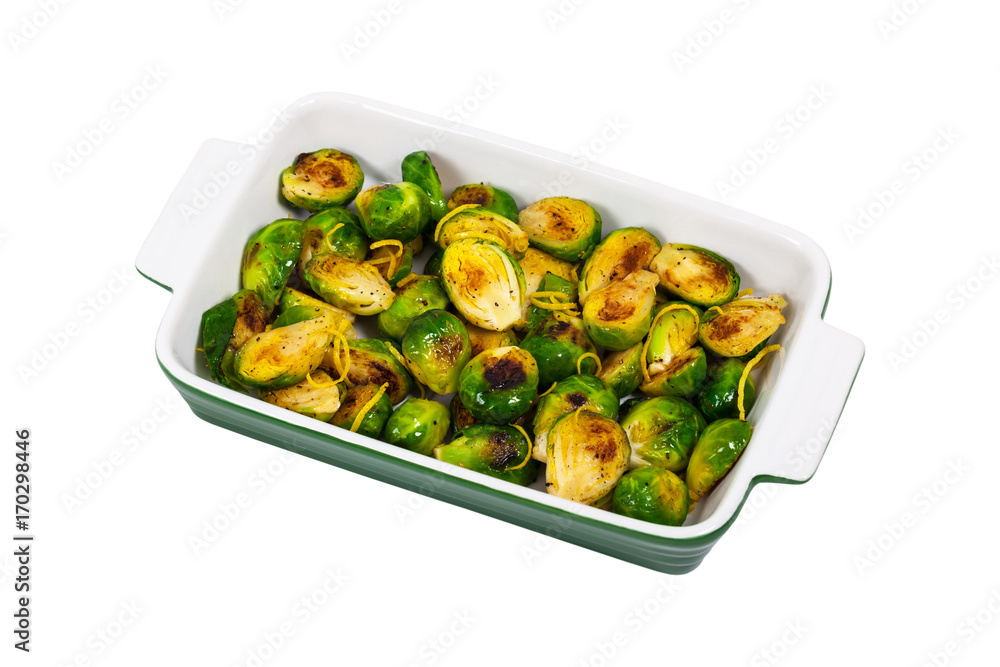 Brussels Sprouts Cabbage With Lemon Isolated on White background. Selective focus. Brussels Sprouts Cabbage With Lemon Isolated on White background. Selective focus.