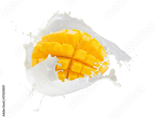 mango with milk splash isolated on a white background