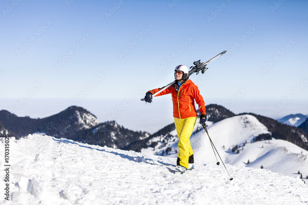 Ski holiday, Skier hiking in mountains, Sudelfeld, Bavaria, Germany Ski holiday, Skier hiking in mountains, Sudelfeld, Bavaria, Germany