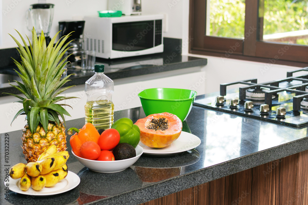 Fresh fruits and vegetables in the kitchen Fresh fruits and vegetables in the kitchen