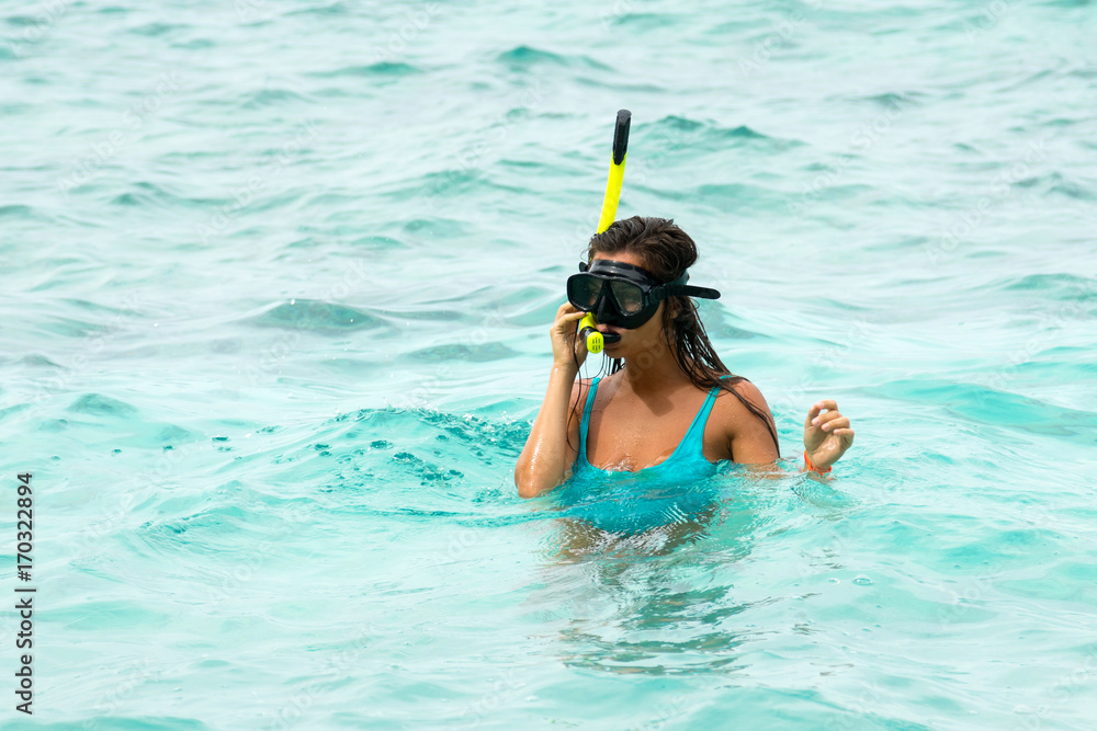Woman in the sea during snorkeling