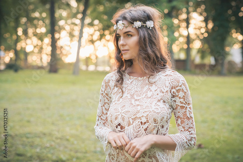 Photos Beautiful woman wearing lace dress and circlet of flowers
