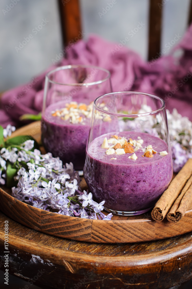 Berry smoothies with oatmeal on old-fasionated chair Berry smoothies with oatmeal on old-fasionated chair
