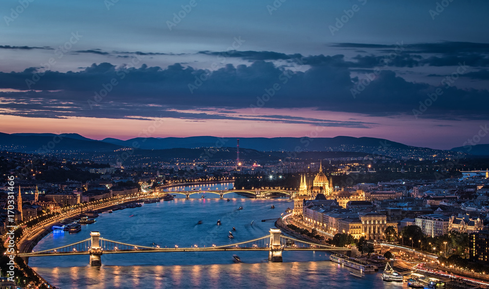 Sunset over the Chain Bridge and the Hungarian Parliament in Budapest, Hungary