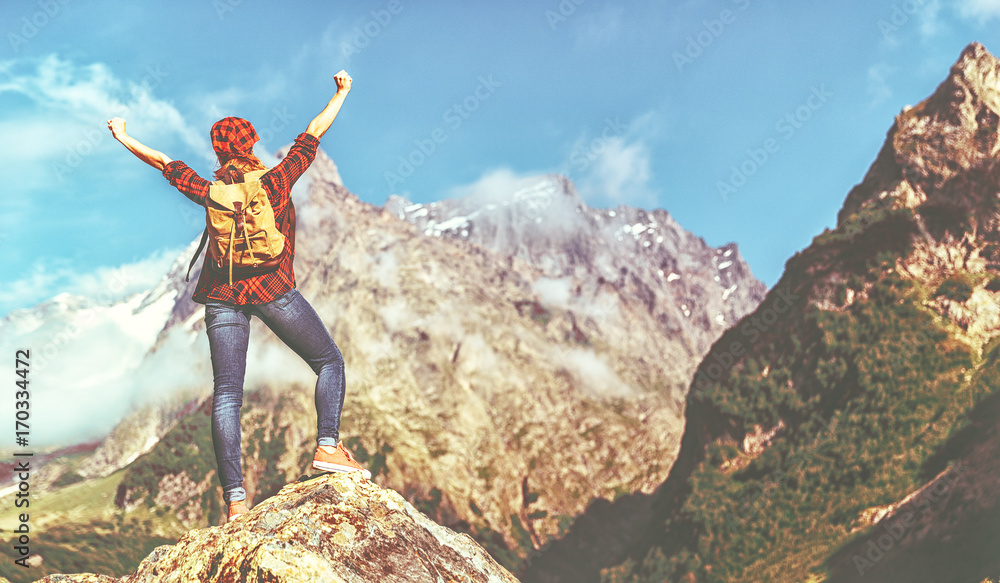 Woman tourist at top of mountain at sunset outdoors during hike in summer. Woman tourist at top of mountain at sunset outdoors during hike in summer.