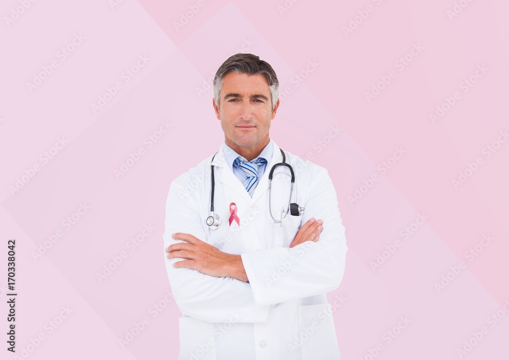 Doctor man with breast cancer awareness ribbon Doctor man with breast cancer awareness ribbon