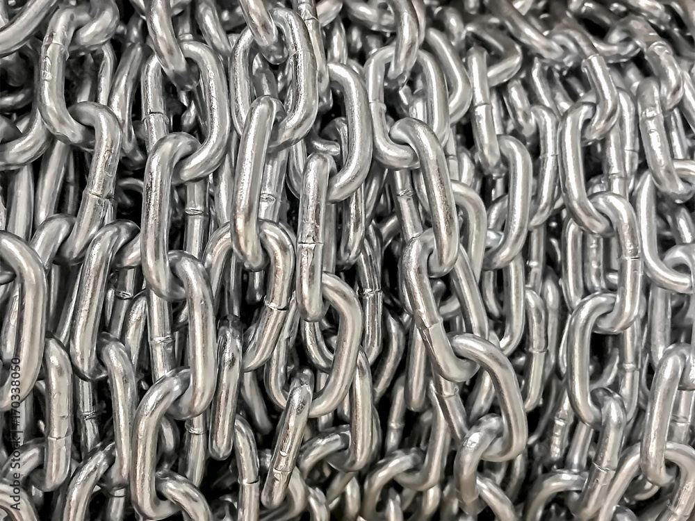 Industrial background - metal chains close-up Industrial background - metal chains close-up