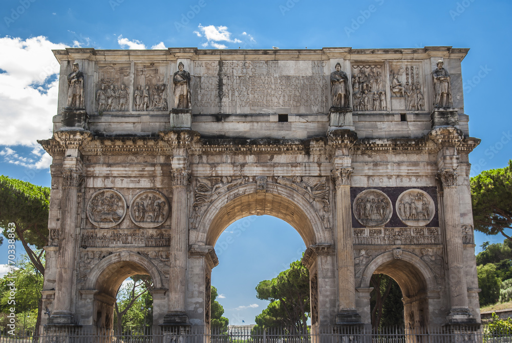 Arch of Constantine in sunny holidays with blue sky