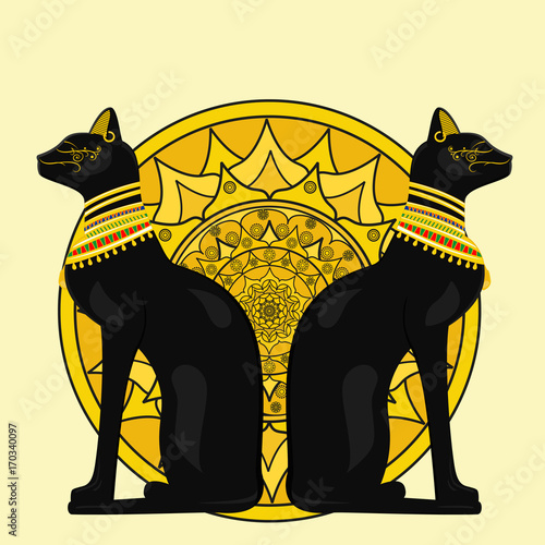 Two Egyptian cats in the background of a yellow circle