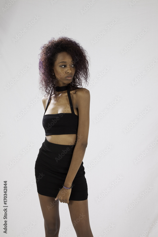 Lovely Black woman looking thoughtful Lovely Black woman looking thoughtful