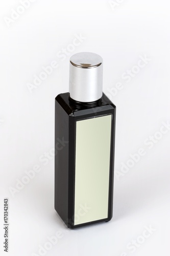 Beautiful bottle with perfume on a white background