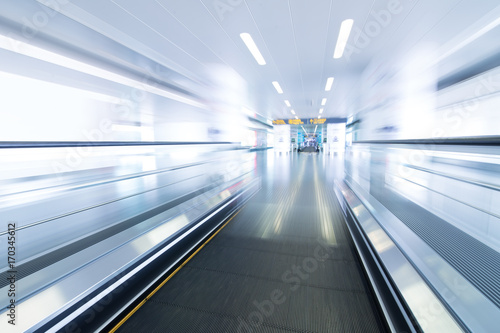 Moving walkway and light on background.