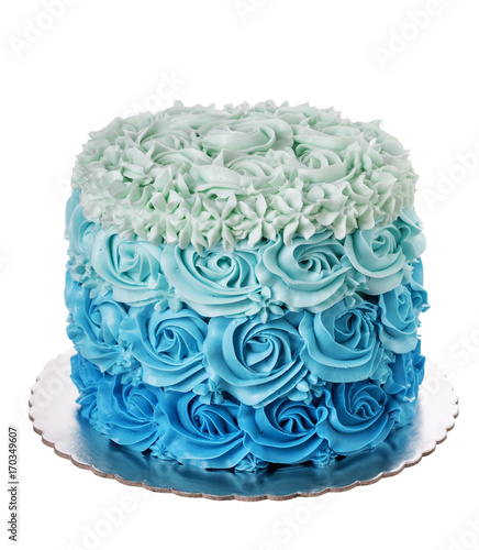 Cream cake with blue hues degrade. On white background. photo