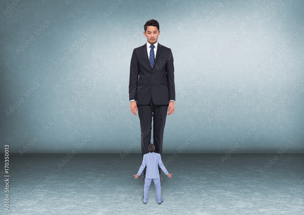 Scared small business man looking at a big business man Scared small business man looking at a big business man