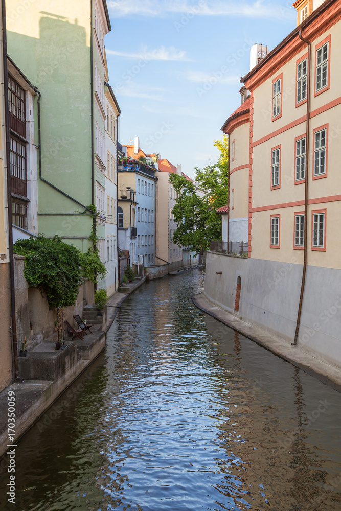 Old colorful buildings and water canal on the Kampa Island in Prague, Czech Republic.