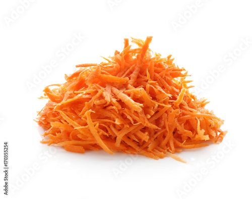 Heap of grated carrot on white background