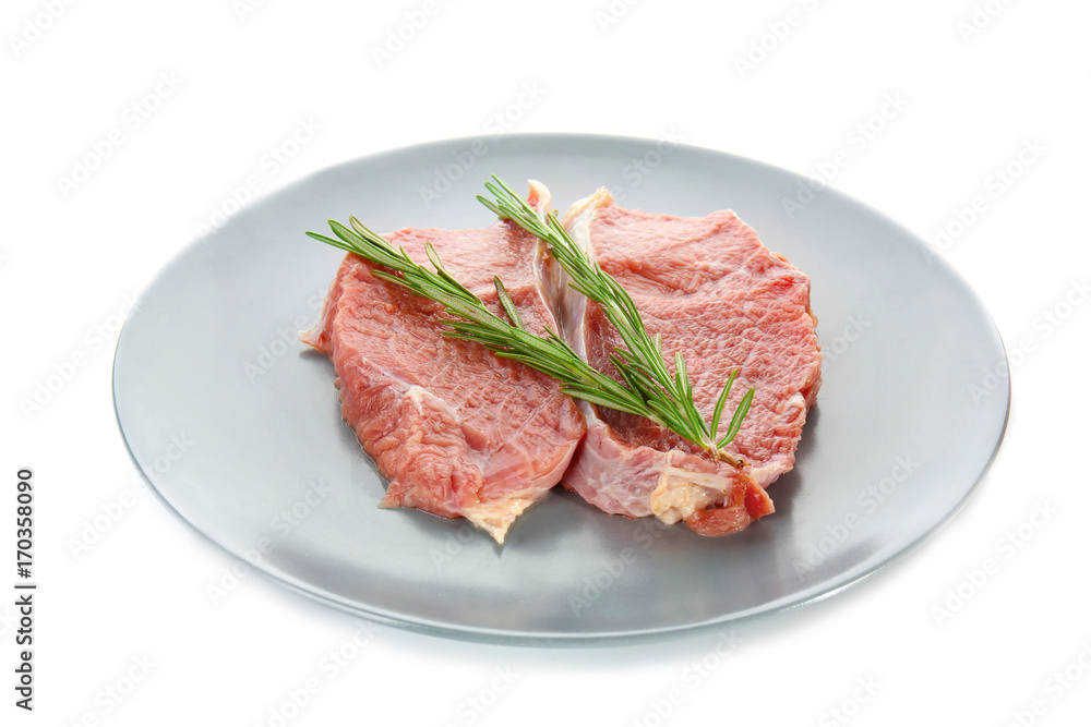 Plate with fresh raw meat, isolated on white Plate with fresh raw meat, isolated on white