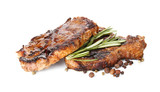 Tasty steaks with rosemary on white background