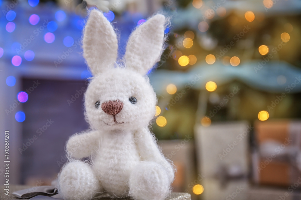 Cute toy for baby in decorated room for Christmas Cute toy for baby in decorated room for Christmas