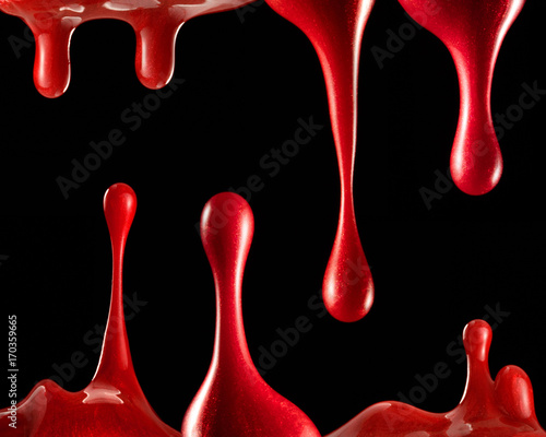 Red paint on black background