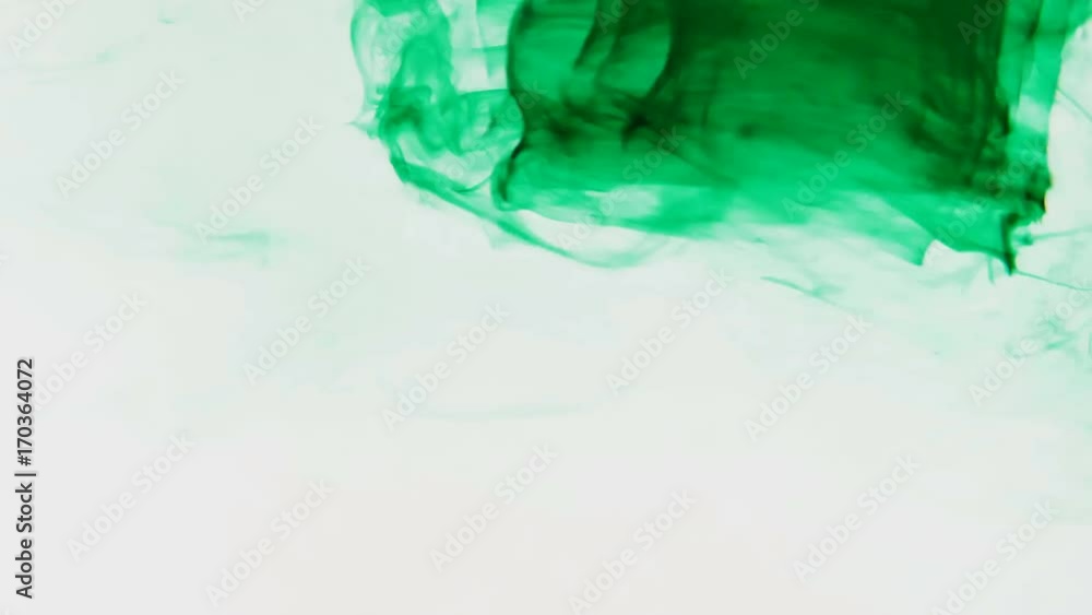 Green ink twisting in water with white background including alpha matte in 4K resolution Green ink twisting in water with white background including alpha matte in 4K resolution