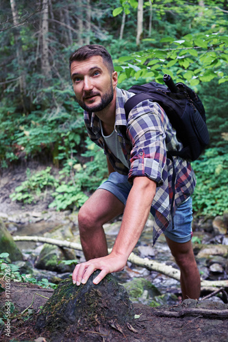 Male hiker in mountain forest