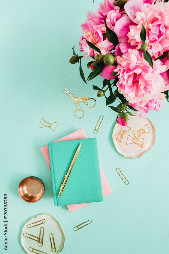 Blank paper notebook, pink flowers, golden stationery on marble background.  Flat lay, top view feminine home office desk Stock Photo - Alamy