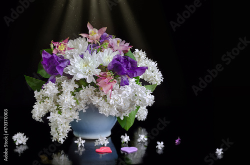 Flowers and hearts on a black background