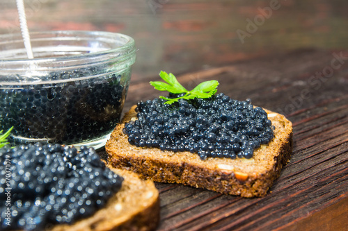 Fresh caviar for snacks and alcohol. Russian appetizer. photo