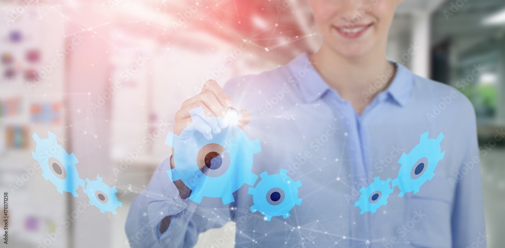 Obraz premium Composite image of businesswoman writing on digital screen