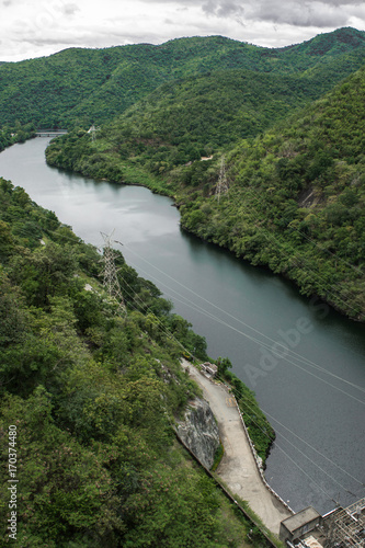 The power station at the Phumibol Dam in Thailand on the Khwae Yai river in tak Province. Rockfill dam with nature in asia for background photo