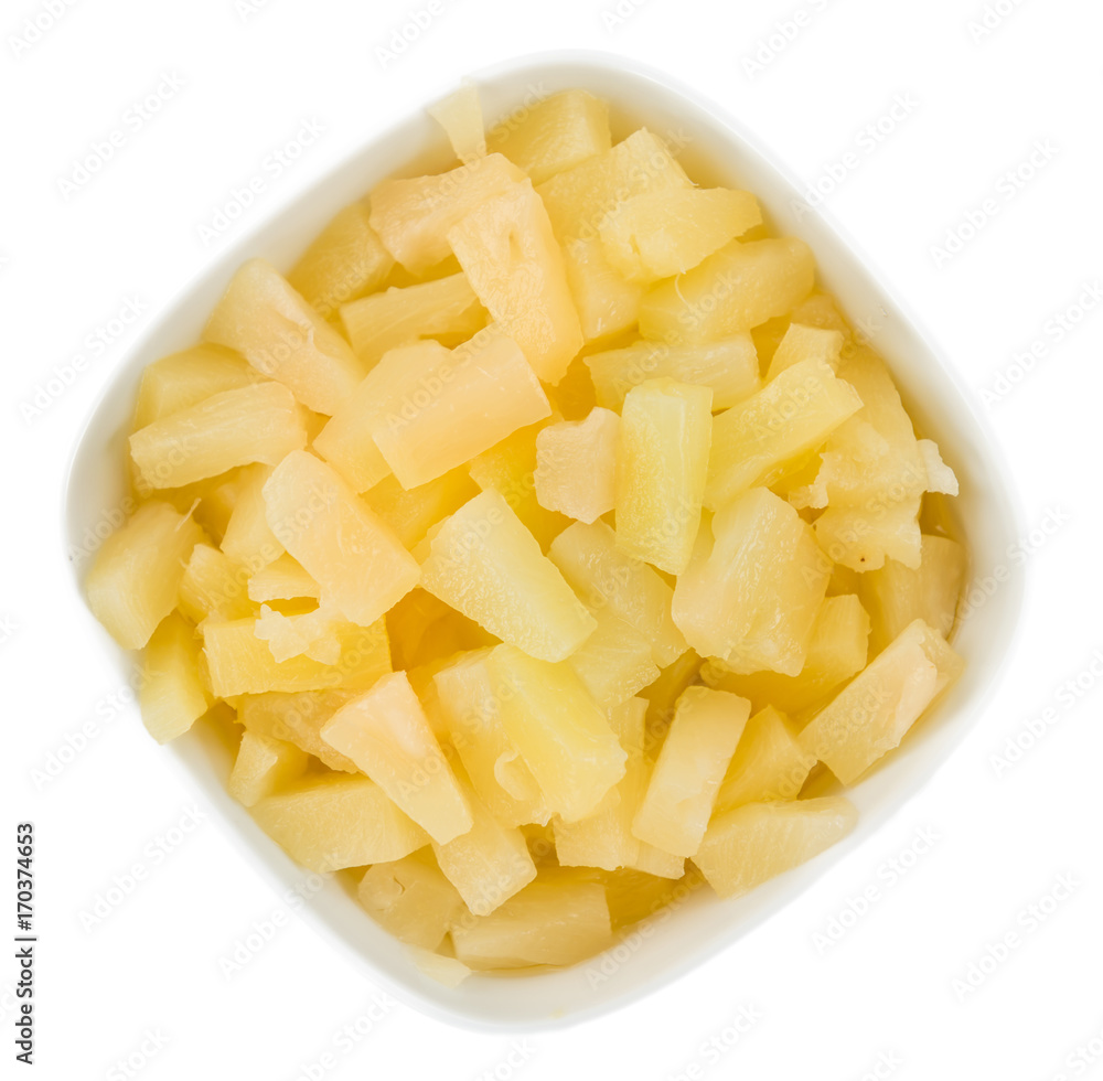 Portion of Preserved Pineapple pieces isolated on white