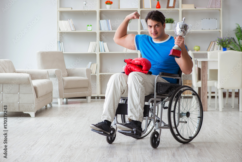Disabled boxer at wheelchair recovering from injury Disabled boxer at wheelchair recovering from injury